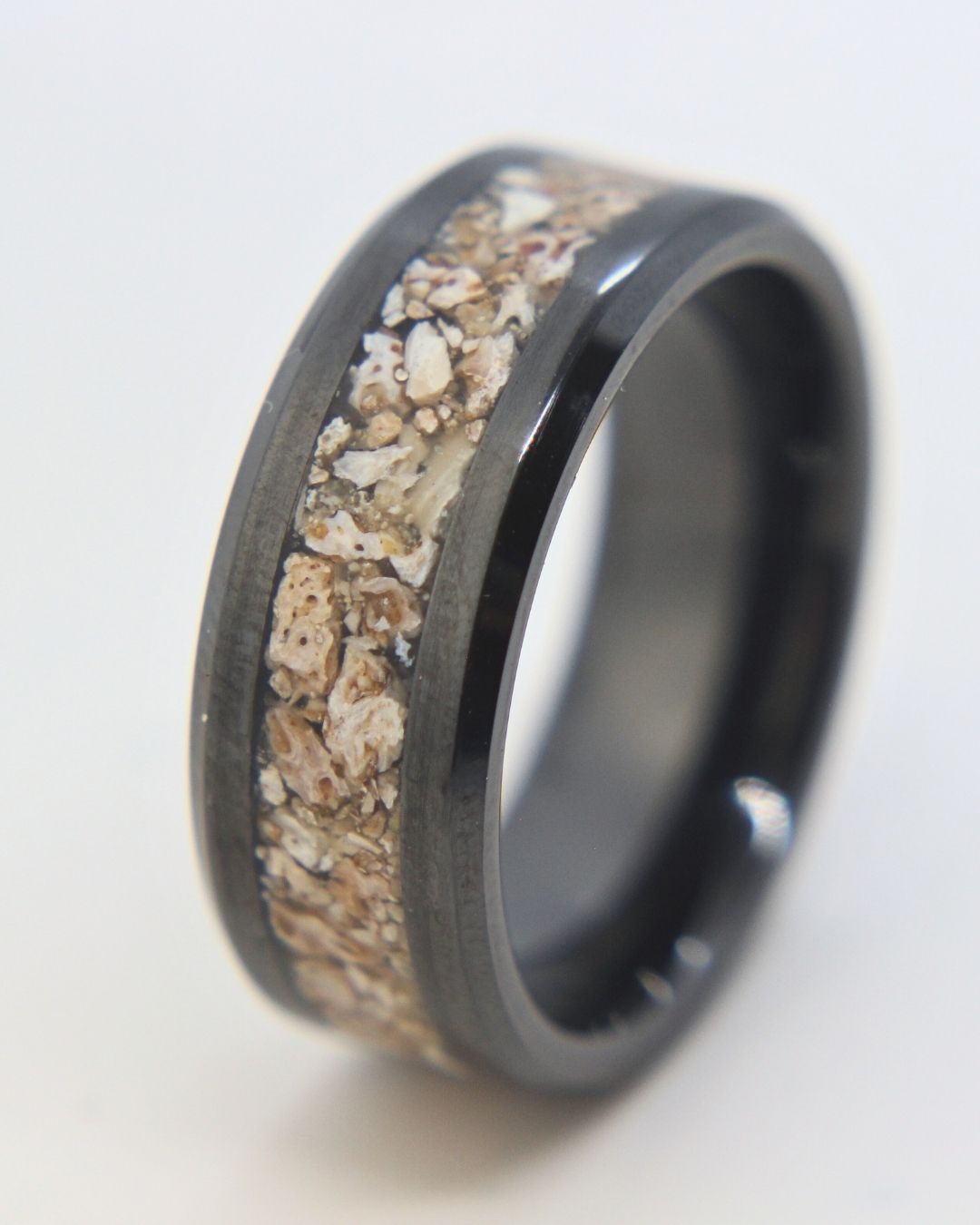 Zirconium ring with Plesiosaurus fossil fragments inlay, handmade in Cape Town — RHYN