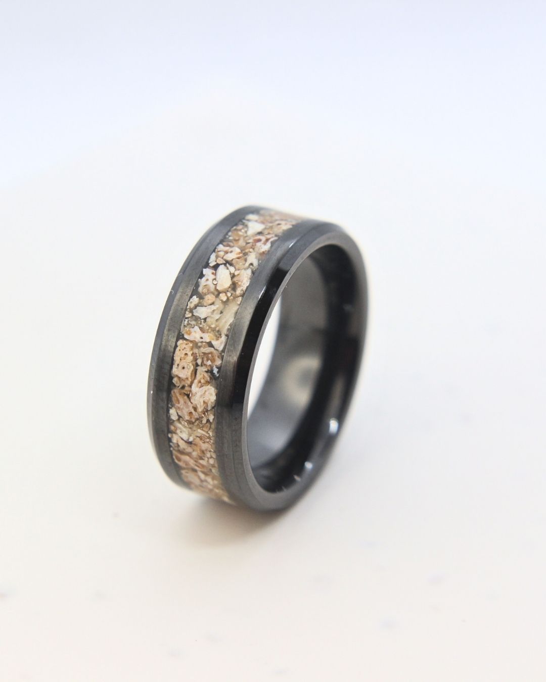 Zirconium ring with Plesiosaurus fossil fragments inlay, handmade in Cape Town — RHYN
