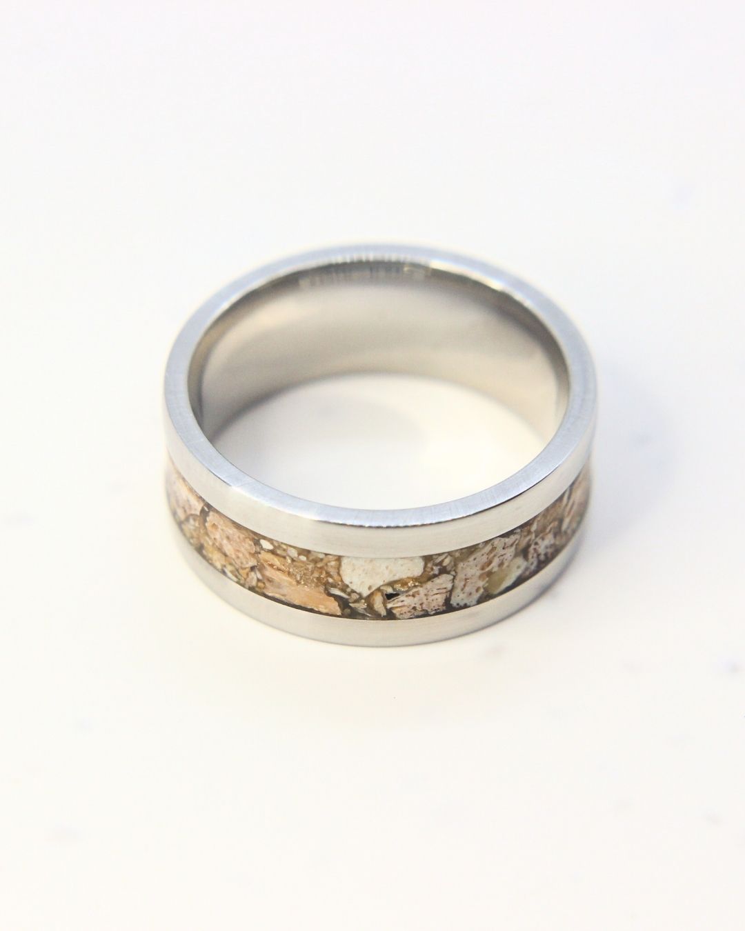 Stainless steel ring with Plesiosaurus fossil fragments inlay, handmade in Cape Town — RHYN