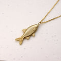Hand-cast brass fish pendant necklace, small-batch jewellery Cape Town — RHYN