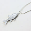 Sterling silver fish pendant necklace, handmade in Cape Town — RHYN