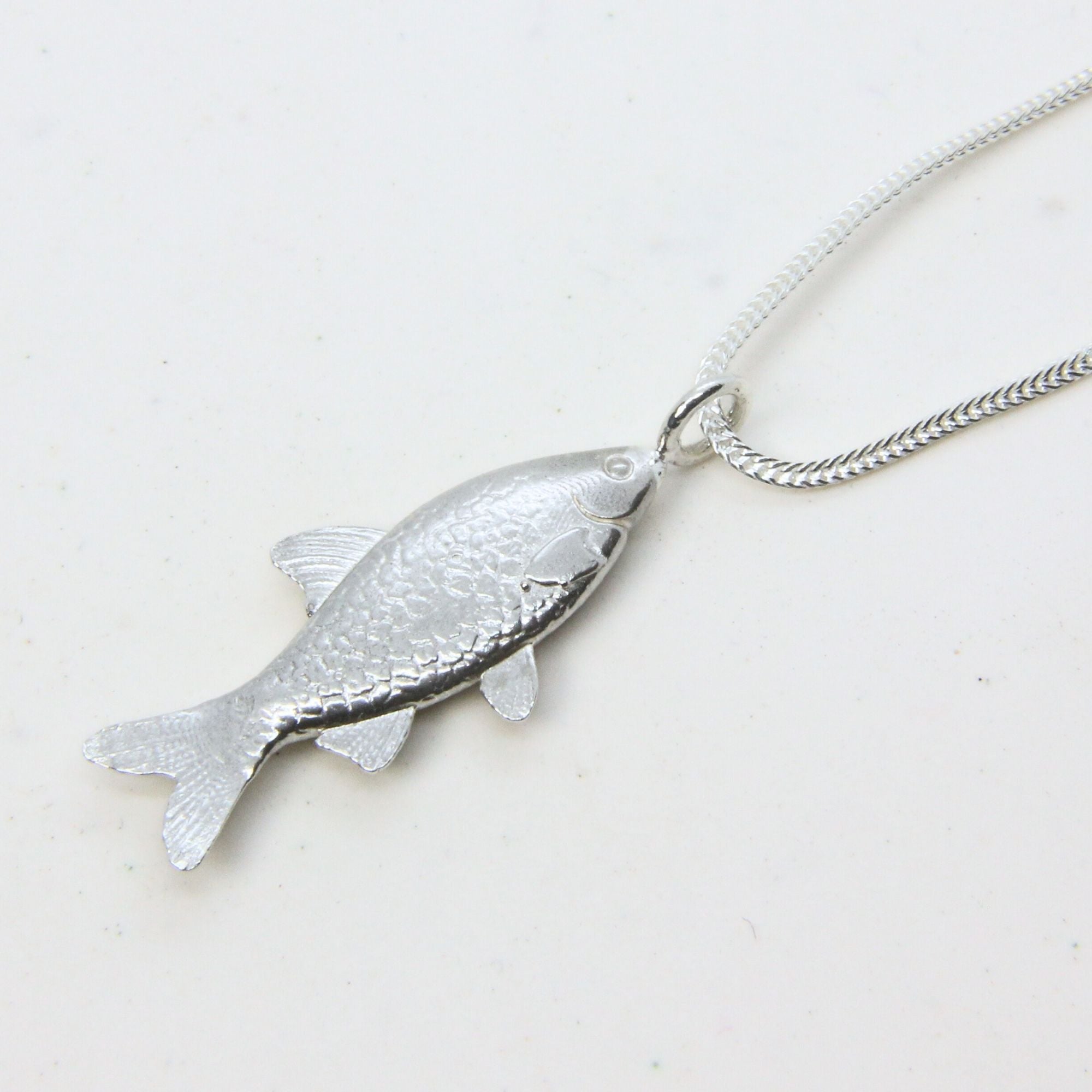 Sterling silver fish pendant necklace, handmade in Cape Town — RHYN
