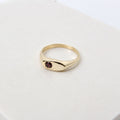 Hand-cast brass signet ring with a garnet gemstone, small-batch jewellery Cape Town — RHYN