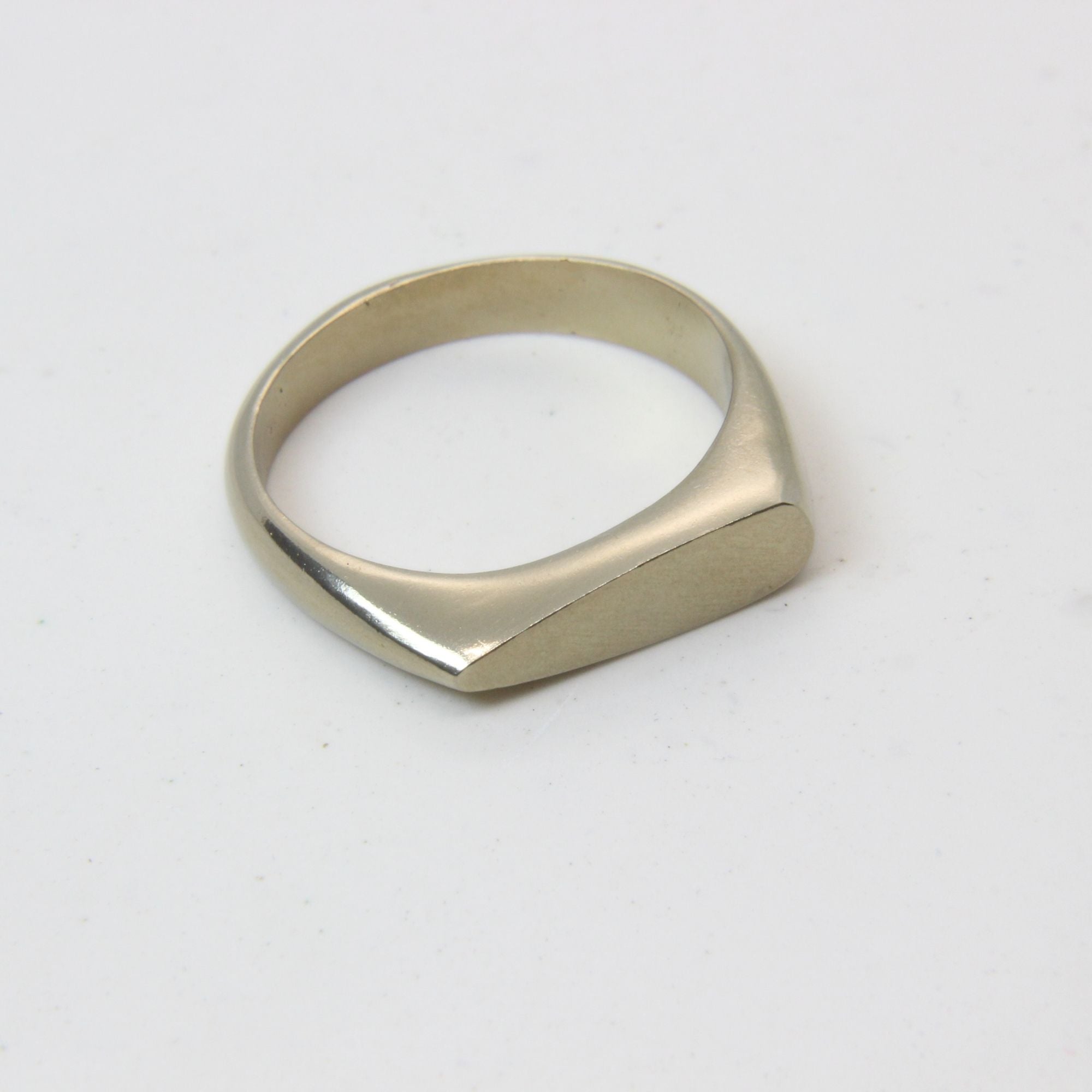 Brass signet ring with drop-shaped face, hand-cast Cape Town jewellery — RHYN