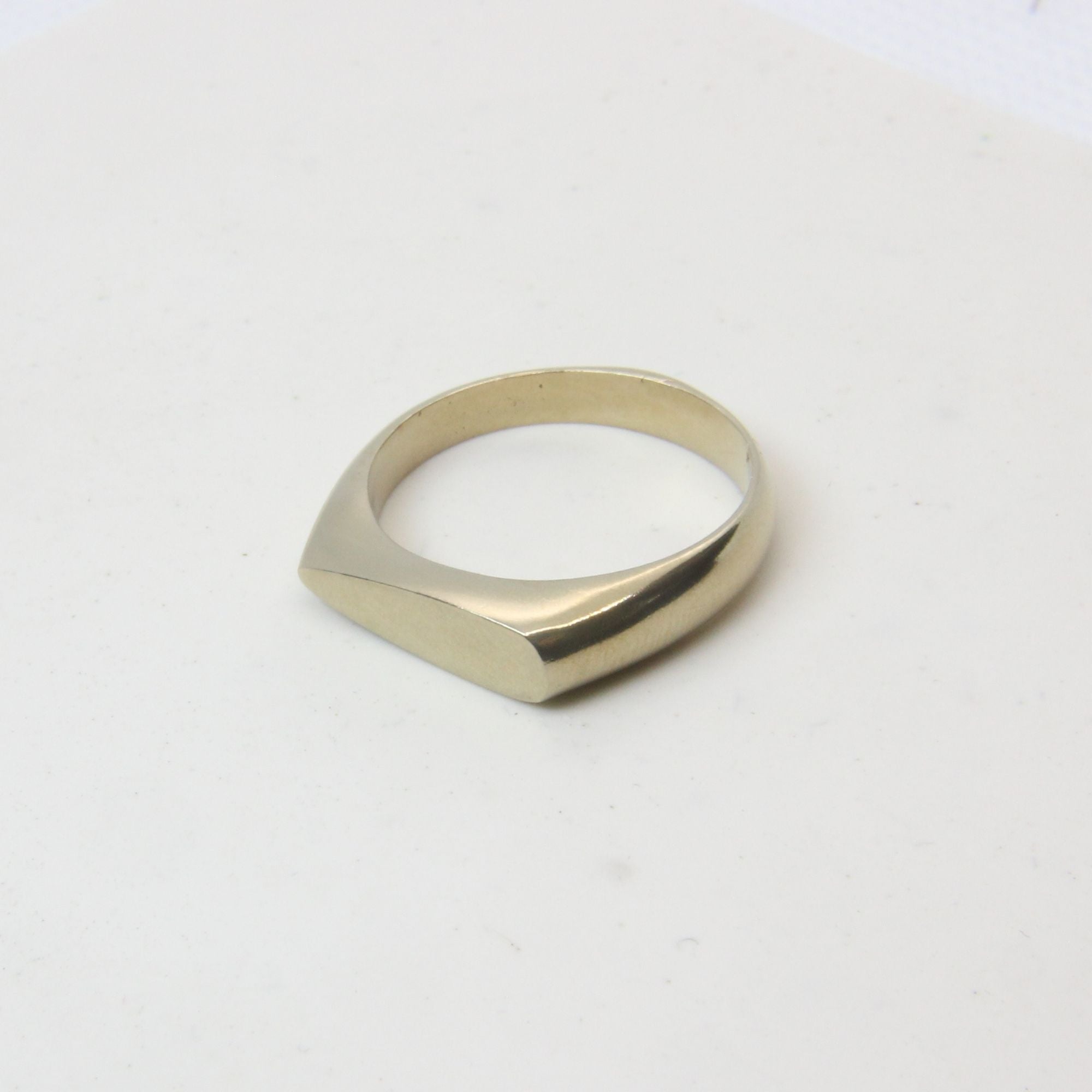 Brass signet ring with drop-shaped face, hand-cast Cape Town jewellery — RHYN