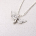 Hand-cast sterling silver moth pendant necklace, small-batch jewellery Cape Town — RHYN